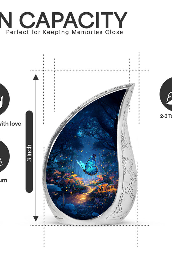 Serene Blue Butterfly Cremation Urn angled view of lid and engraved motif - smooth teardrop contour featuring butterfly art - mini keepsake memorial for portion of cremation ashes
