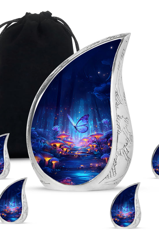 Icy Blue Butterfly Cremation Urn side profile showing urn shape - flowing teardrop butterfly silhouette on curved aluminum - memorial set with one large and four small urns