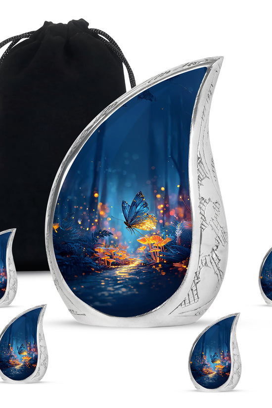 Powder Blue Butterfly Cremation Urn side profile showing urn shape - rounded teardrop butterfly design with delicate detail - memorial set with one large and four small urns