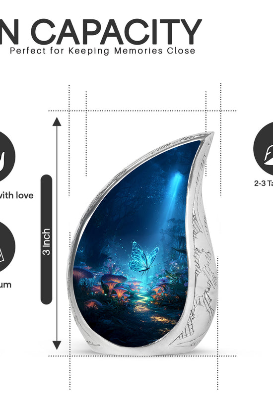 Indigo Butterfly Cremation Urn angled view of lid and engraved motif - flowing teardrop butterfly silhouette on curved aluminum - mini keepsake memorial for portion of cremation ashes