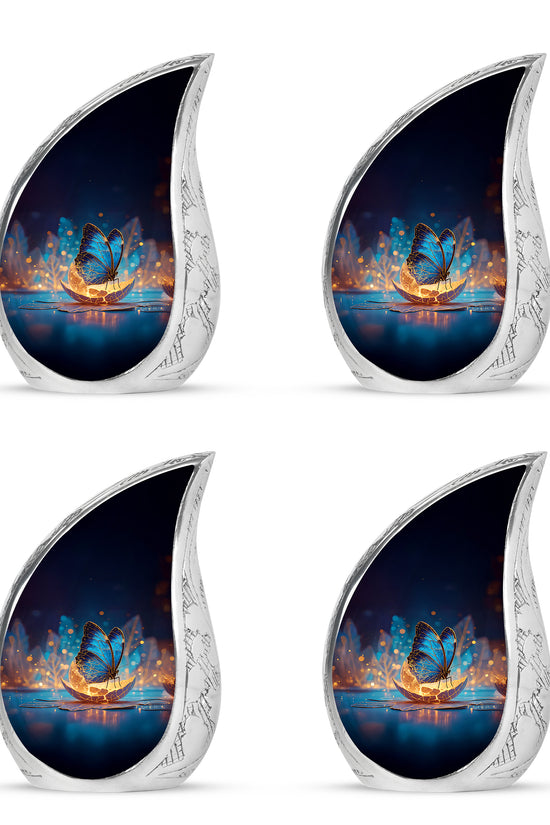 Icy Blue Butterfly Cremation Urn close-up of engraving and surface detail - rounded teardrop butterfly design with delicate detail - 10 inch aluminum urn for cremated remains