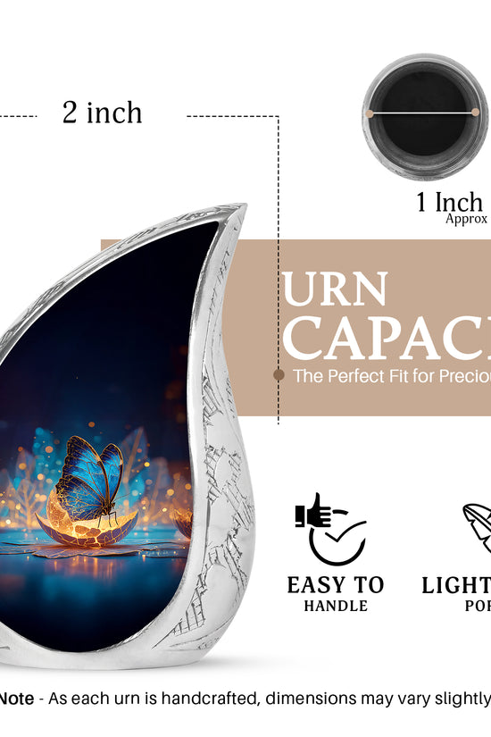 Serene Blue Butterfly Cremation Urn angled view of lid and engraved motif - smooth teardrop contour featuring butterfly art - mini keepsake memorial for portion of cremation ashes