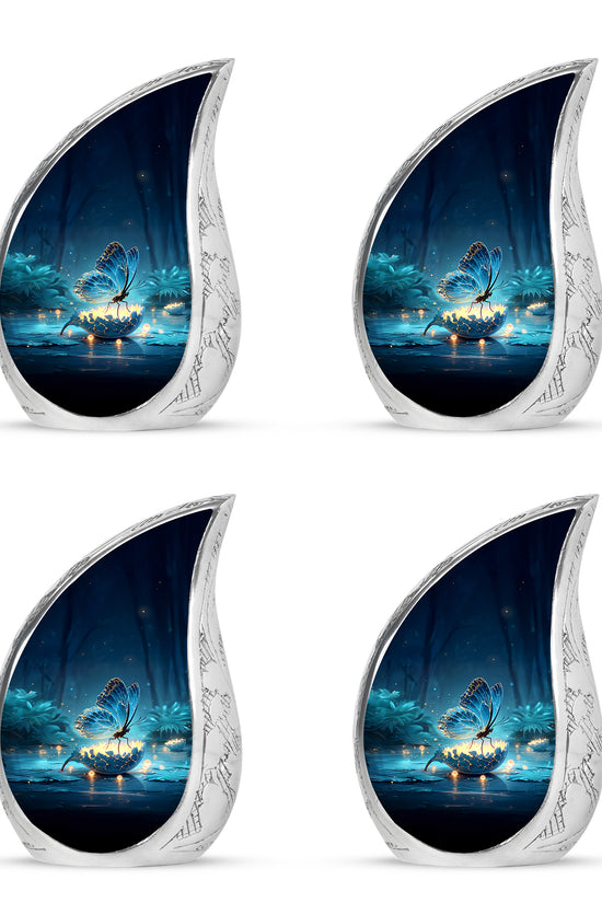 Navy Blue Butterfly Cremation Urn close-up of engraving and surface detail - flowing teardrop butterfly silhouette on curved aluminum - 10 inch aluminum urn for cremated remains
