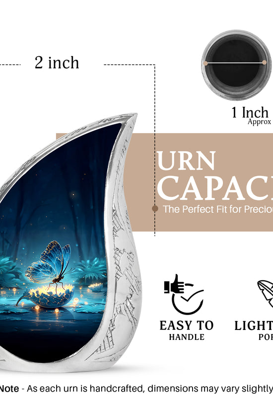 Cornflower Blue Butterfly Cremation Urn angled view of lid and engraved motif - smooth teardrop contour featuring butterfly art - mini keepsake memorial for portion of cremation ashes
