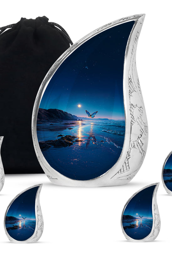 Bright Blue Butterfly Cremation Urn side profile showing urn shape - smooth teardrop contour featuring butterfly art - memorial set with one large and four small urns