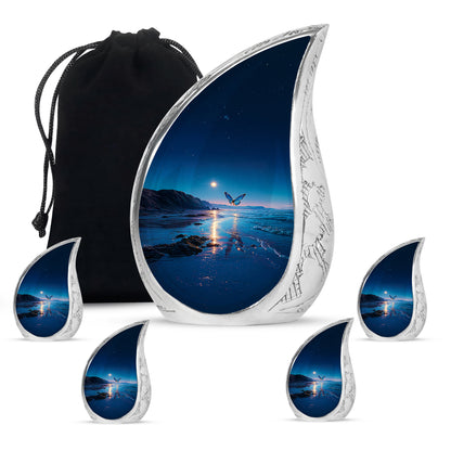 Bright Blue Butterfly Cremation Urn side profile showing urn shape - smooth teardrop contour featuring butterfly art - memorial set with one large and four small urns