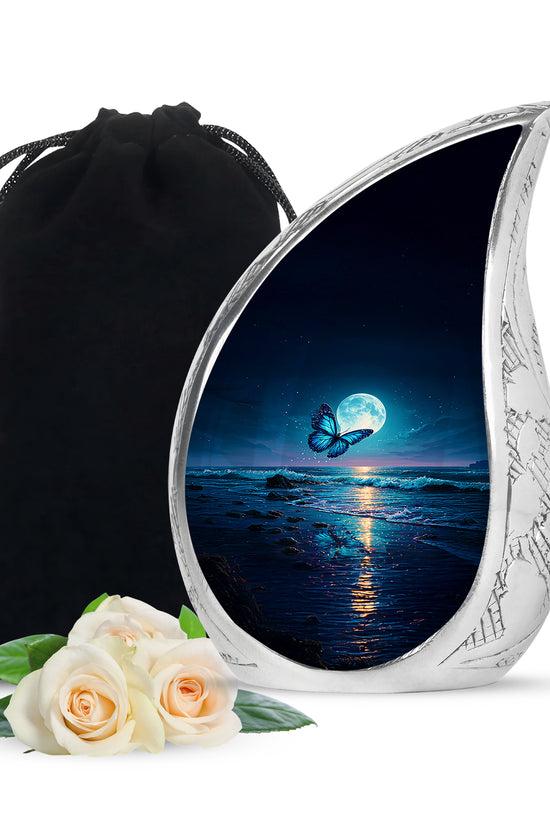 Slate Blue Butterfly Cremation Urn front view showing detailed design - flowing teardrop butterfly silhouette on curved aluminum - full-size 10 inch 200 cubic inch adult cremation urn
