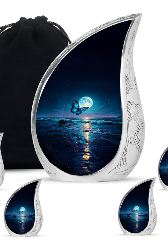Navy Blue Butterfly Cremation Urn side profile showing urn shape - rounded teardrop butterfly design with delicate detail - memorial set with one large and four small urns
