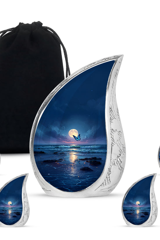 Vivid Blue Butterfly Cremation Urn side profile showing urn shape - smooth teardrop contour featuring butterfly art - memorial set with one large and four small urns
