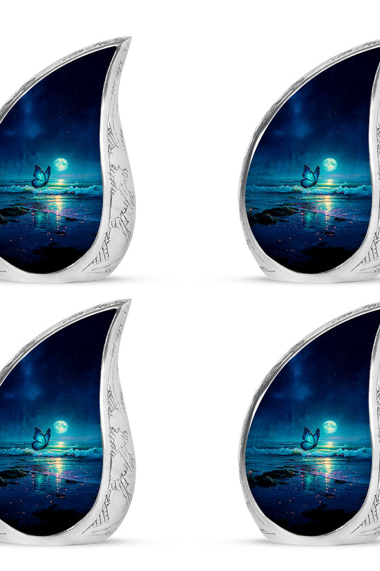 Sapphire Blue Butterfly Cremation Urn close-up of engraving and surface detail - graceful tear-shaped urn with butterfly motif - 10 inch aluminum urn for cremated remains