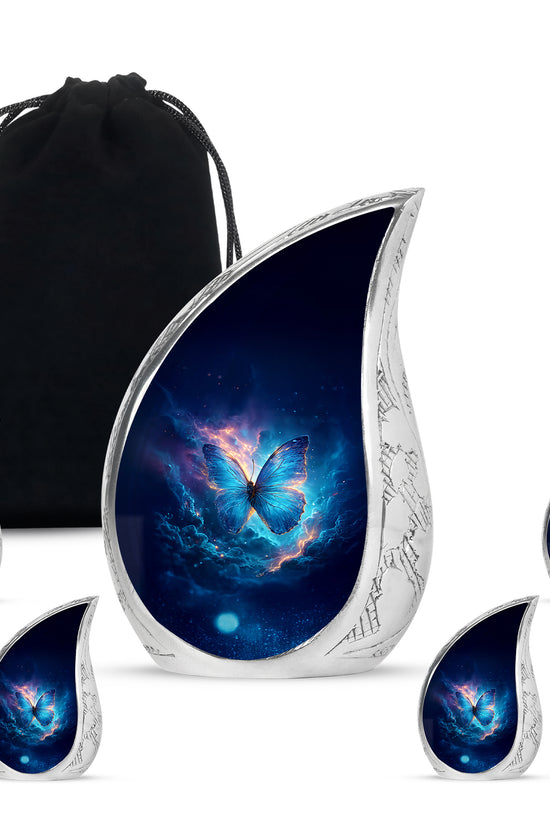 Powder Blue Butterfly Cremation Urn side profile showing urn shape - flowing teardrop butterfly silhouette on curved aluminum - memorial set with one large and four small urns