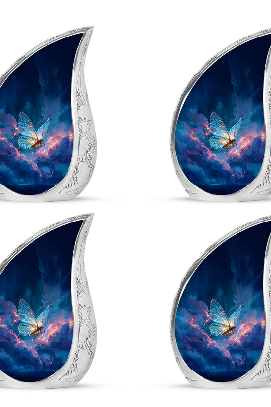 Azure Butterfly Cremation Urn close-up of engraving and surface detail - flowing teardrop butterfly silhouette on curved aluminum - 10 inch aluminum urn for cremated remains