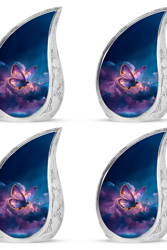 Misty Blue Butterfly Cremation Urn close-up of engraving and surface detail - flowing teardrop butterfly silhouette on curved aluminum - 10 inch aluminum urn for cremated remains