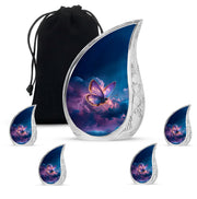 Cobalt Blue Butterfly Cremation Urn side profile showing urn shape - graceful tear-shaped urn with butterfly motif - memorial set with one large and four small urns