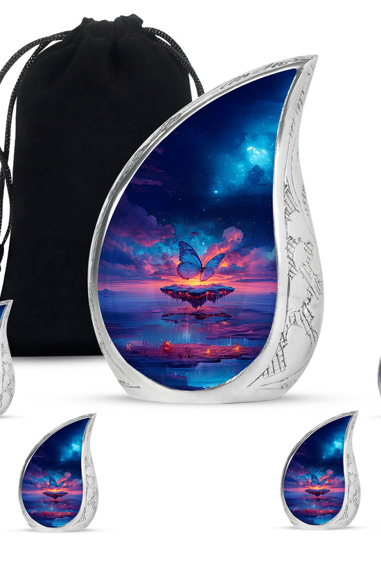 Celestial Blue Butterfly Cremation Urn side profile showing urn shape - rounded teardrop butterfly design with delicate detail - memorial set with one large and four small urns