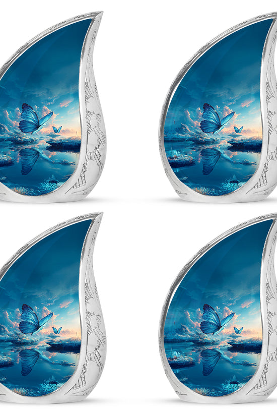 Serene Blue Butterfly Cremation Urn close-up of engraving and surface detail - smooth teardrop contour featuring butterfly art - 10 inch aluminum urn for cremated remains