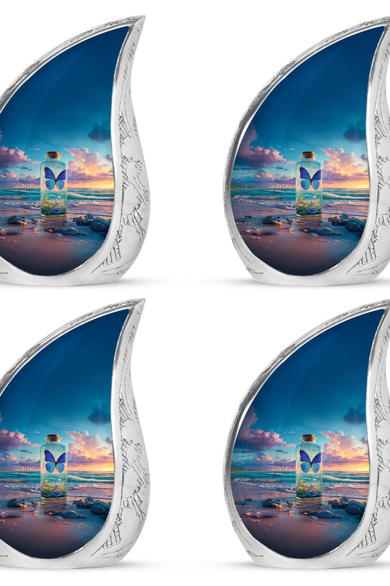 Azure Butterfly Cremation Urn close-up of engraving and surface detail - flowing teardrop butterfly silhouette on curved aluminum - 10 inch aluminum urn for cremated remains