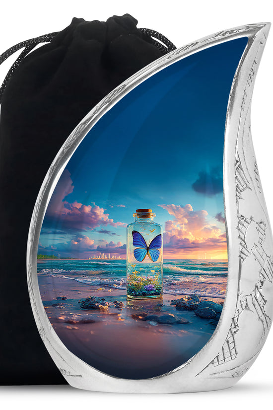 Calming Blue Butterfly Cremation Urn front view showing detailed design - graceful tear-shaped urn with butterfly motif - full-size 10 inch 200 cubic inch adult cremation urn