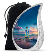 Calming Blue Butterfly Cremation Urn front view showing detailed design - graceful tear-shaped urn with butterfly motif - full-size 10 inch 200 cubic inch adult cremation urn