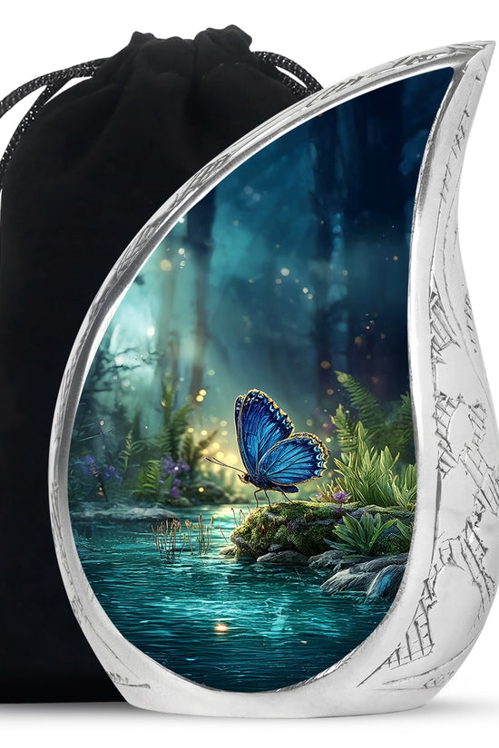 Slate Blue Butterfly Cremation Urn front view showing detailed design - flowing teardrop butterfly silhouette on curved aluminum - full-size 10 inch 200 cubic inch adult cremation urn