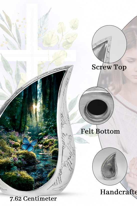Mint Green Butterfly Cremation Urn angled view of lid and engraved motif - graceful tear-shaped urn with butterfly motif - mini keepsake memorial for portion of cremation ashes