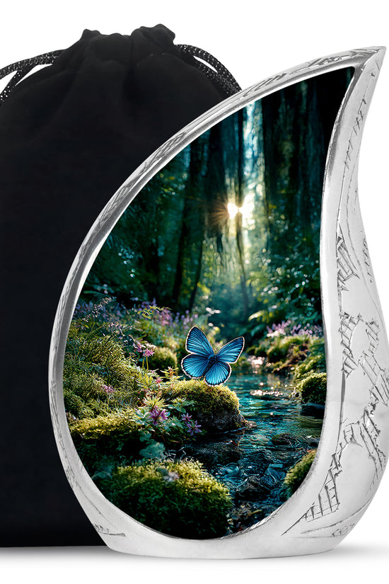 Moss Green Butterfly Cremation Urn front view showing detailed design - flowing teardrop butterfly silhouette on curved aluminum - full-size 10 inch 200 cubic inch adult cremation urn