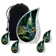Sage Green Butterfly Cremation Urn side profile showing urn shape - flowing teardrop butterfly silhouette on curved aluminum - memorial set with one large and four small urns