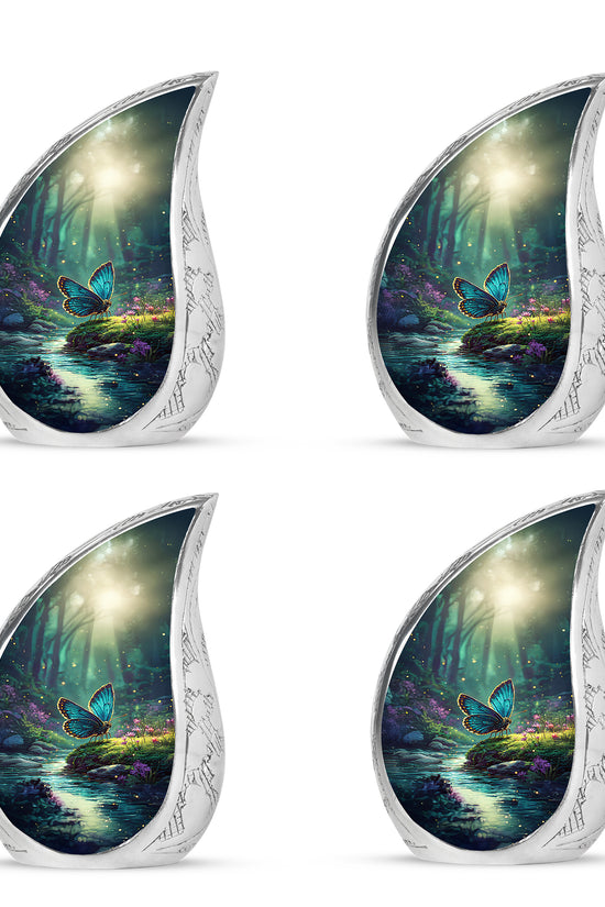 Jewel Teal Butterfly Cremation Urn close-up of engraving and surface detail - rounded teardrop butterfly design with delicate detail - 10 inch aluminum urn for cremated remains