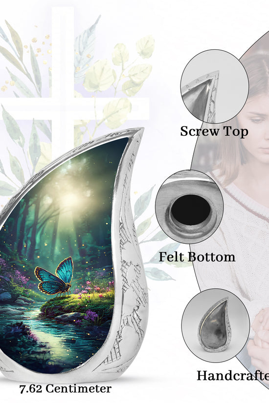 Ocean Teal Butterfly Cremation Urn angled view of lid and engraved motif - rounded teardrop butterfly design with delicate detail - mini keepsake memorial for portion of cremation ashes