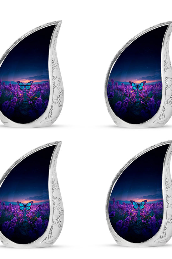 Cobalt Blue Butterfly Cremation Urn close-up of engraving and surface detail - smooth teardrop contour featuring butterfly art - 10 inch aluminum urn for cremated remains
