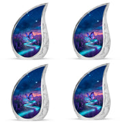 Cobalt Blue Butterfly Cremation Urn close-up of engraving and surface detail - graceful tear-shaped urn with butterfly motif - 10 inch aluminum urn for cremated remains
