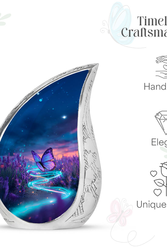 Misty Blue Butterfly Cremation Urn angled view of lid and engraved motif - rounded teardrop butterfly design with delicate detail - mini keepsake memorial for portion of cremation ashes