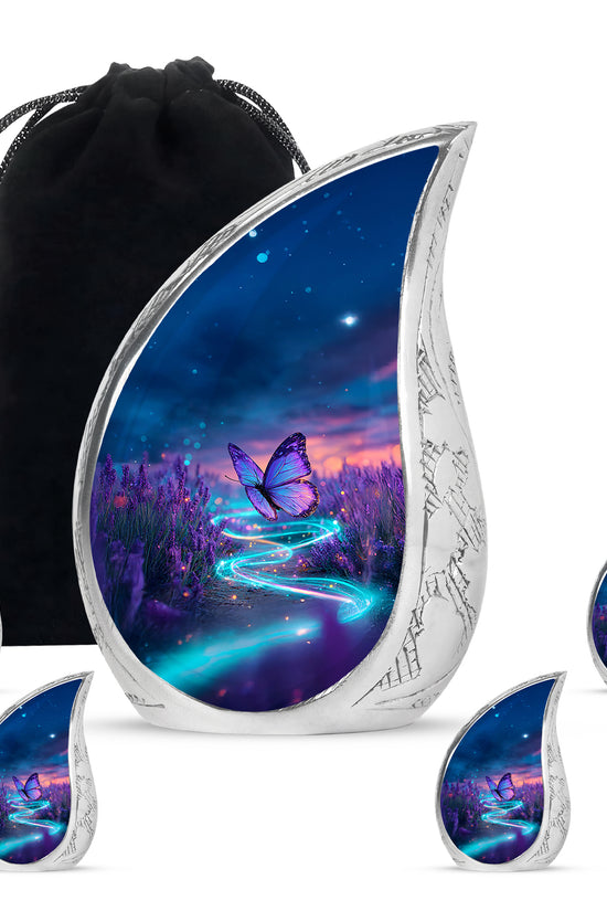 Indigo Butterfly Cremation Urn side profile showing urn shape - rounded teardrop butterfly design with delicate detail - memorial set with one large and four small urns