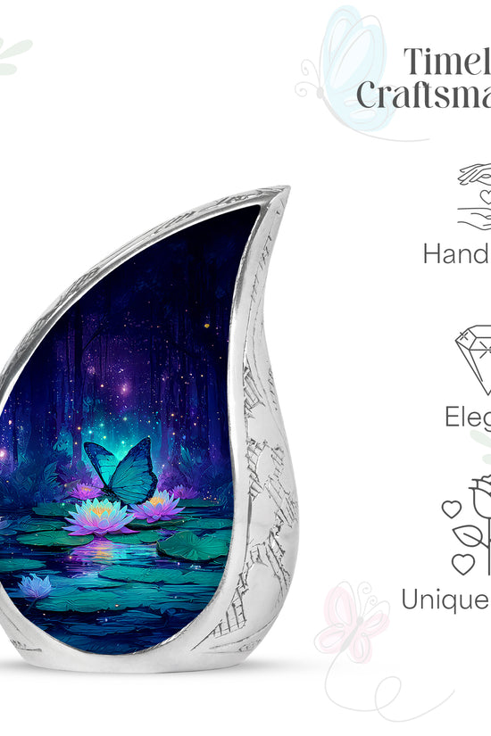 Powder Blue Butterfly Cremation Urn angled view of lid and engraved motif - flowing teardrop butterfly silhouette on curved aluminum - mini keepsake memorial for portion of cremation ashes