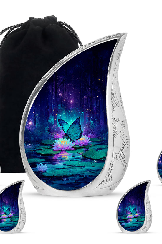 Cornflower Blue Butterfly Cremation Urn side profile showing urn shape - graceful tear-shaped urn with butterfly motif - memorial set with one large and four small urns