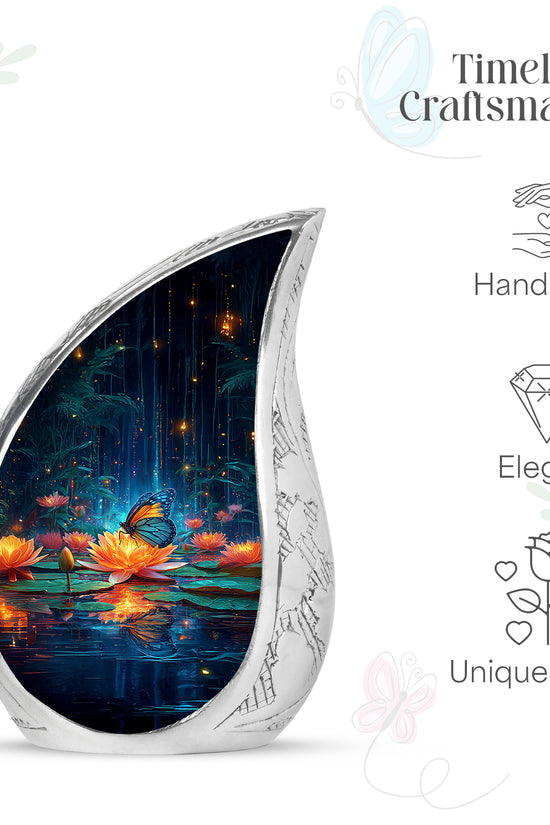 Dusty Blue Butterfly Cremation Urn angled view of lid and engraved motif - rounded teardrop butterfly design with delicate detail - mini keepsake memorial for portion of cremation ashes