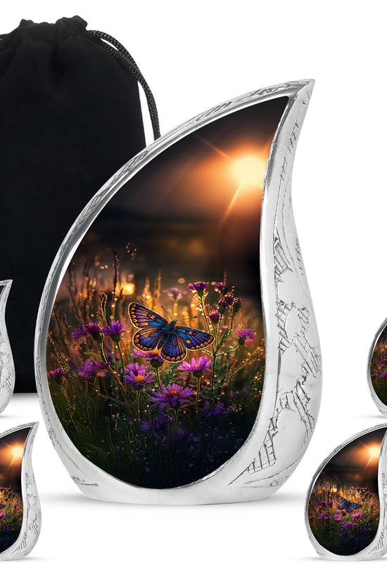 Amber Gold Butterfly Cremation Urn side profile showing urn shape - flowing teardrop butterfly silhouette on curved aluminum - memorial set with one large and four small urns
