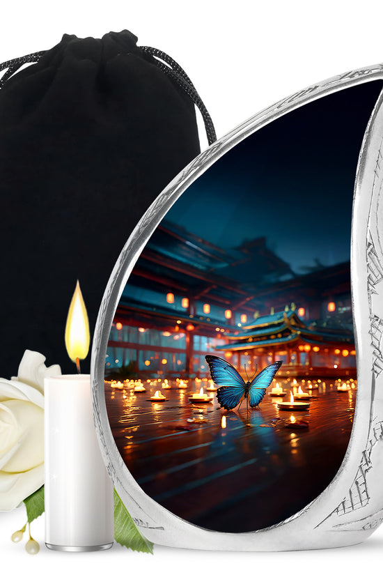 Cobalt Blue Butterfly Cremation Urn front view showing detailed design - graceful tear-shaped urn with butterfly motif - full-size 10 inch 200 cubic inch adult cremation urn