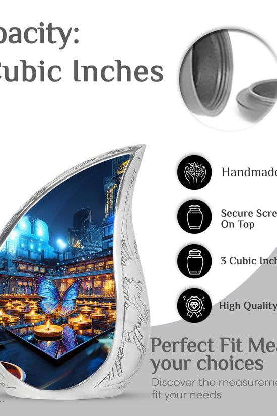 Pewter Gray Butterfly Cremation Urn angled view of lid and engraved motif - rounded teardrop butterfly design with delicate detail - mini keepsake memorial for portion of cremation ashes