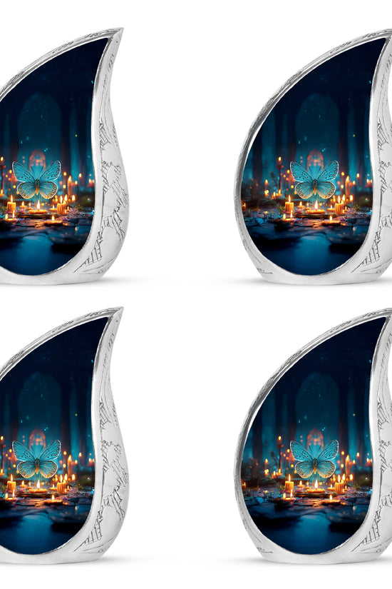 Vivid Blue Butterfly Cremation Urn close-up of engraving and surface detail - smooth teardrop contour featuring butterfly art - 10 inch aluminum urn for cremated remains