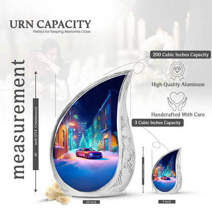 Celestial Blue Car Cremation Urn angled view of lid and engraved motif - rounded teardrop car design with delicate detail - mini keepsake memorial for portion of cremation ashes