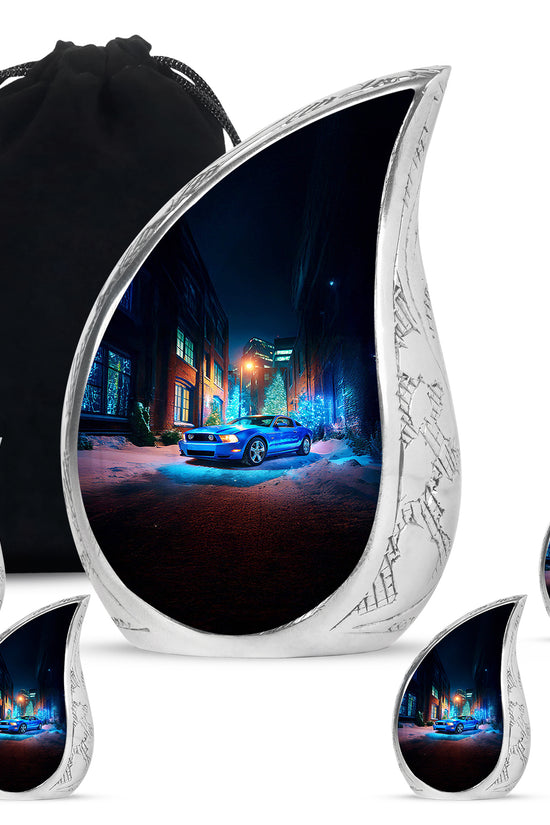 Sapphire Blue Car Cremation Urn side profile showing urn shape - graceful tear-shaped urn with car motif - memorial set with one large and four small urns
