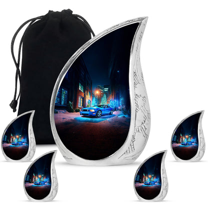 Sapphire Blue Car Cremation Urn side profile showing urn shape - graceful tear-shaped urn with car motif - memorial set with one large and four small urns