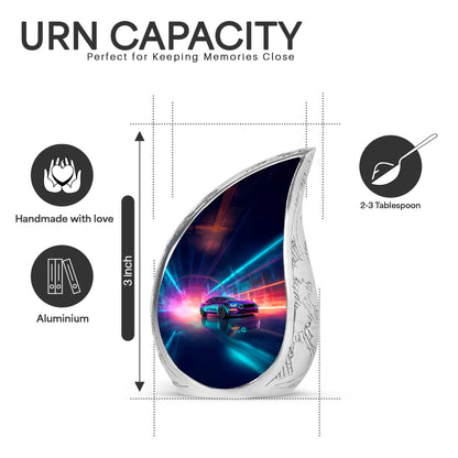 Sapphire Blue Car Cremation Urn angled view of lid and engraved motif - smooth teardrop contour featuring car art - mini keepsake memorial for portion of cremation ashes