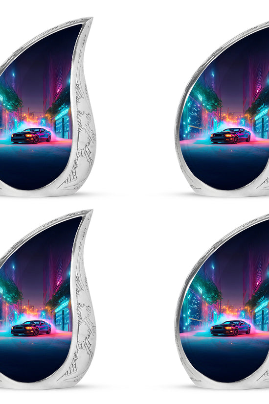 Vivid Blue Car Cremation Urn close-up of engraving and surface detail - graceful tear-shaped urn with car motif - 10 inch aluminum urn for cremated remains