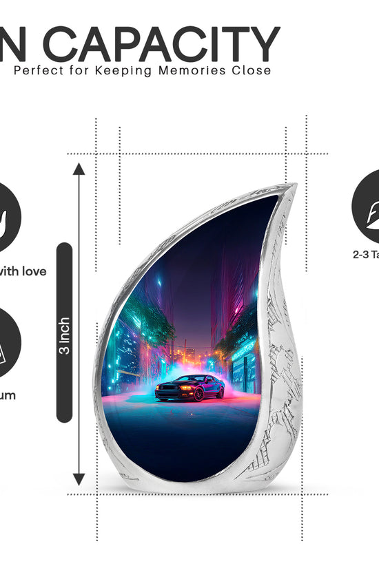Sky Blue Car Cremation Urn angled view of lid and engraved motif - flowing teardrop car silhouette on curved aluminum - mini keepsake memorial for portion of cremation ashes
