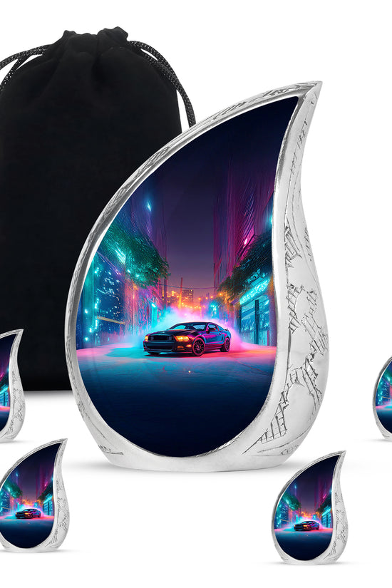 Bright Blue Car Cremation Urn side profile showing urn shape - graceful tear-shaped urn with car motif - memorial set with one large and four small urns