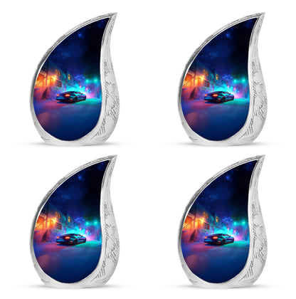 Sapphire Blue Car Cremation Urn close-up of engraving and surface detail - graceful tear-shaped urn with car motif - 10 inch aluminum urn for cremated remains