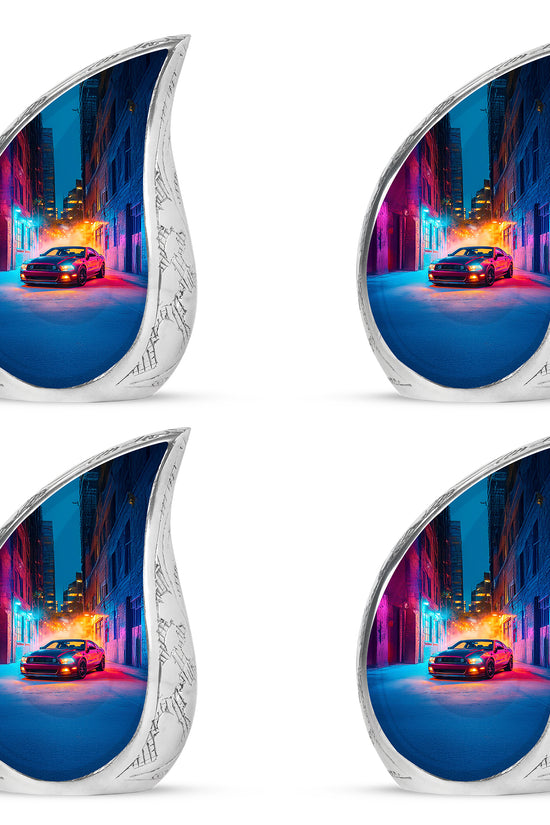 Royal Purple Car Cremation Urn close-up of engraving and surface detail - graceful tear-shaped urn with car motif - 10 inch aluminum urn for cremated remains