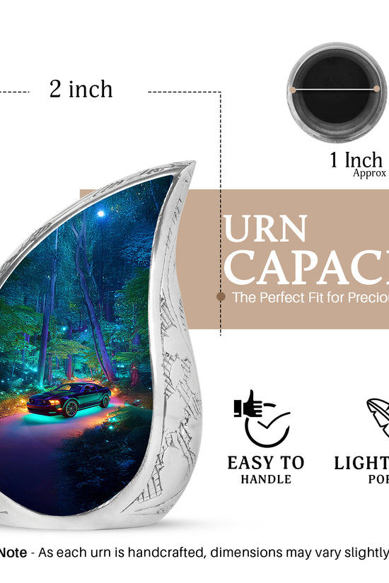 Soft Blue Car Cremation Urn angled view of lid and engraved motif - smooth teardrop contour featuring car art - mini keepsake memorial for portion of cremation ashes